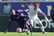 FLORENCE, ITALY - OCTOBER 16: Federico Bernardeschi of ACF Fiorentina battles for the ball with Alejandro Gomez of Atalanta BC during the Serie A match between ACF Fiorentina and Atalanta BC at Stadio Artemio Franchi on October 16, 2016 in Florence, Italy.  (Photo by Gabriele Maltinti/Getty Images)